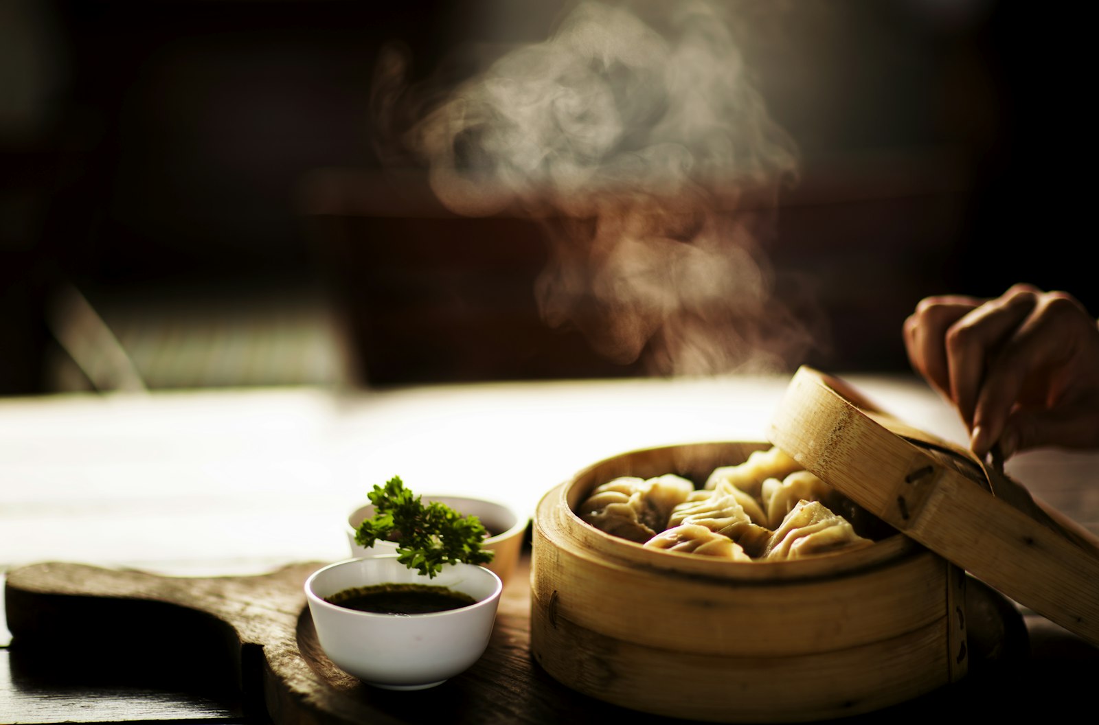 Steamed dumplings on a bamboo steamer